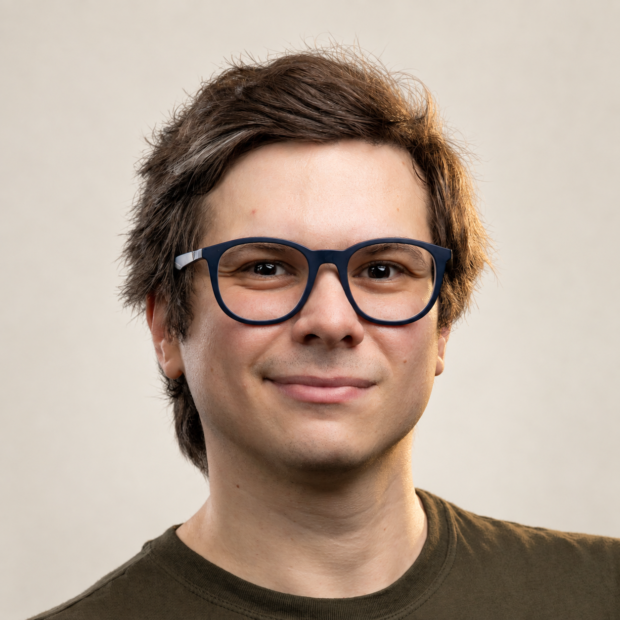 Luiz Piccini wearing blue glasses